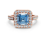Rose gold Fancy Blue Asscher Cut Halo Diamond Ring with Pavé Band and Three-Prong Setting