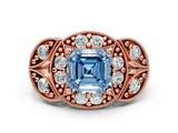 Rose gold Fancy Blue Asscher Cut Halo Milgrain Diamond Engagement Ring with Leaf Band and Four-Prong Setting