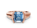 Rose gold Fancy Blue Asscher Cut Solitaire Tension Set Diamond Ring with Split Shank Band