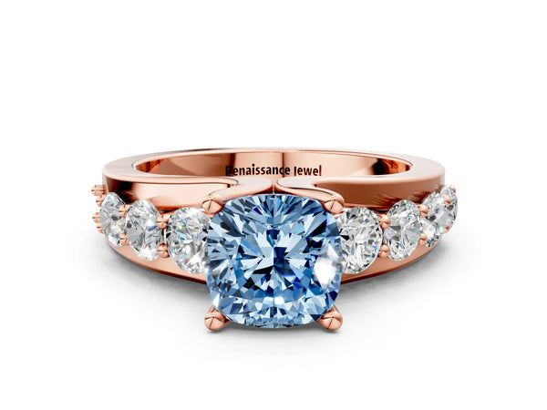 Rose gold Fancy Blue Cushion  Brilliant Solitaire with Side Stones on a Pave Band and Four-Prong Setting