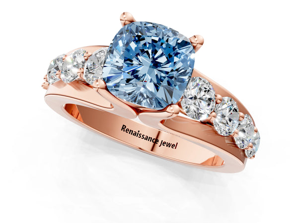 Rose gold Fancy Blue Cushion  Brilliant Solitaire with Side Stones on a Pave Band and Four-Prong Setting