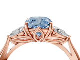 Rose gold Fancy Blue Cushion Cut Diamond Three-Stone Ring with Pear Side Stones and Four-Prong Setting_64