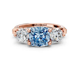 Rose gold Fancy Blue Cushion Cut Diamond Three-Stone Ring with Prong Setting and Pavé Band