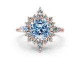 Rose gold Fancy Blue Cushion Cut Halo Diamond Cluster Ring with Marquise and Round Stones on a White Gold Band with Prong Setting