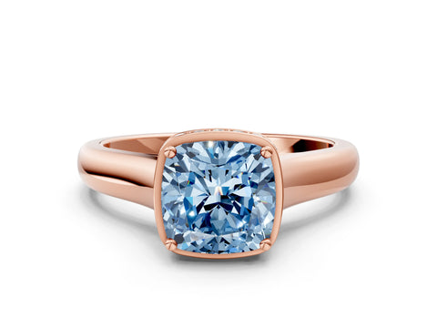 Rose gold Fancy Blue Cushion Cut Solitaire Diamond Engagement Ring with Four-Prong Setting and Tapered Band