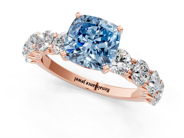 Rose gold Fancy Blue Cushion Cut Diamond Prong Setting with Side Stones on a Pave Band
