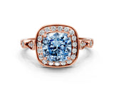 Rose gold Fancy Blue Cushion  Halo Diamond Engagement Ring with Twisted Band and Four-Prong Setting