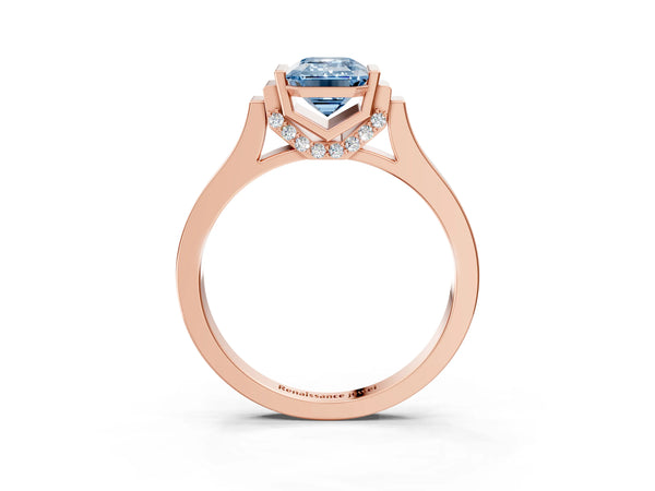 Rose gold Fancy Blue Emerald Cut Brilliant Solitaire Diamond Ring with Channel Set Band and Bar Prong Setting