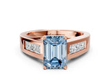 Rose gold Fancy Blue Emerald Cut Cut Channel Set Solitaire Ring with Four-Prong Setting