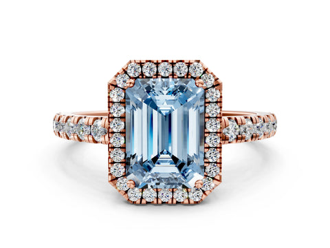 Rose gold Fancy Blue Emerald Cut Diamond Halo Ring with Pavé Band and Four-Prong Setting