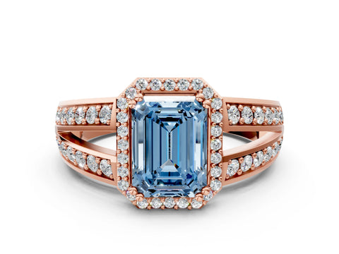 Rose gold Fancy Blue Emerald Cut Diamond Halo Ring with Split Shank Pavé Band and Four-Prong Setting