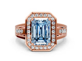 Rose gold Fancy Blue Emerald Cut Diamond Halo Ring with Split Shank and Bezel Accents and Prong Setting