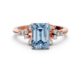 Rose gold Fancy Blue Emerald Cut Diamond Ring with Side Stones and Four-Prong Setting_108