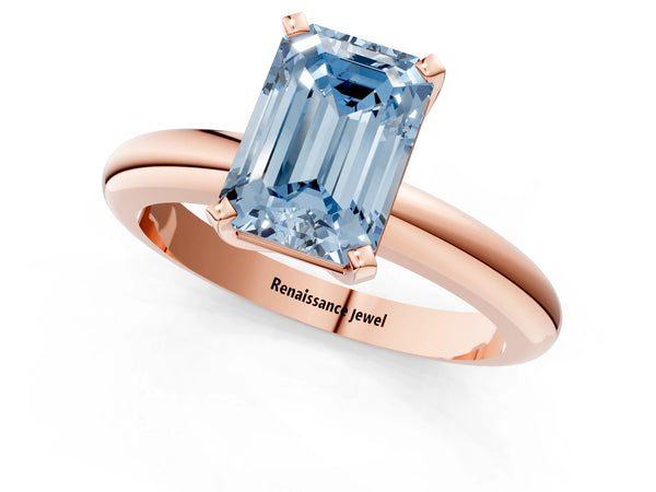 Rose gold Fancy Blue Emerald Cut Diamond Solitaire Engagement Ring with Round Band and Four-Prong Setting
