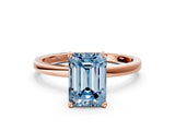 Rose gold Fancy Blue Emerald Cut Diamond Solitaire Ring with Classic Band and Four-Prong Setting