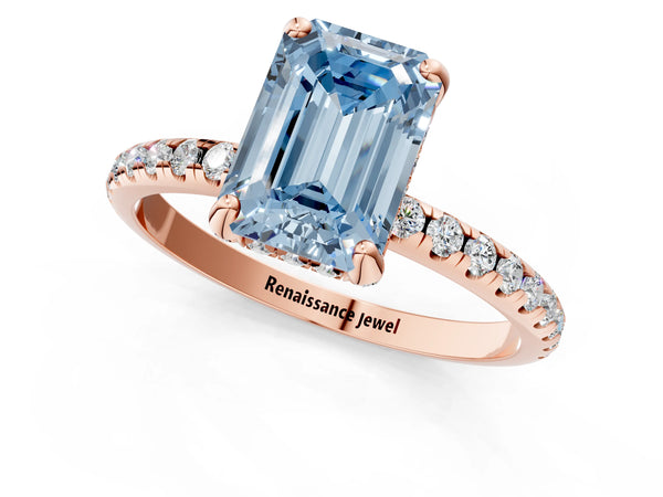 Rose gold Fancy Blue Emerald Cut Diamond Solitaire Ring with Four-Prong Setting and Pavé Band