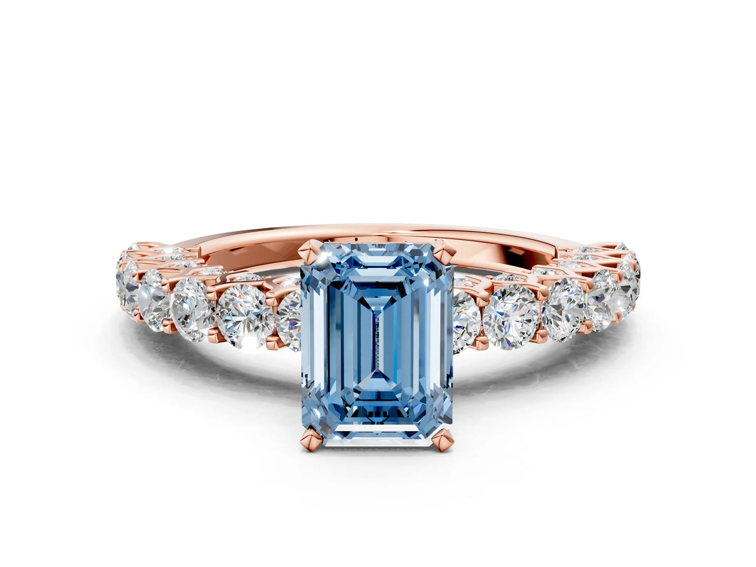 Rose gold Fancy Blue Emerald Cut Diamond Solitaire Ring with Shared Prong Pavé Band and Four-Prong Setting_57
