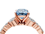 Rose gold Fancy Blue Emerald Cut Diamond Solitaire Ring with Side Stones and Four-Prong Setting_200