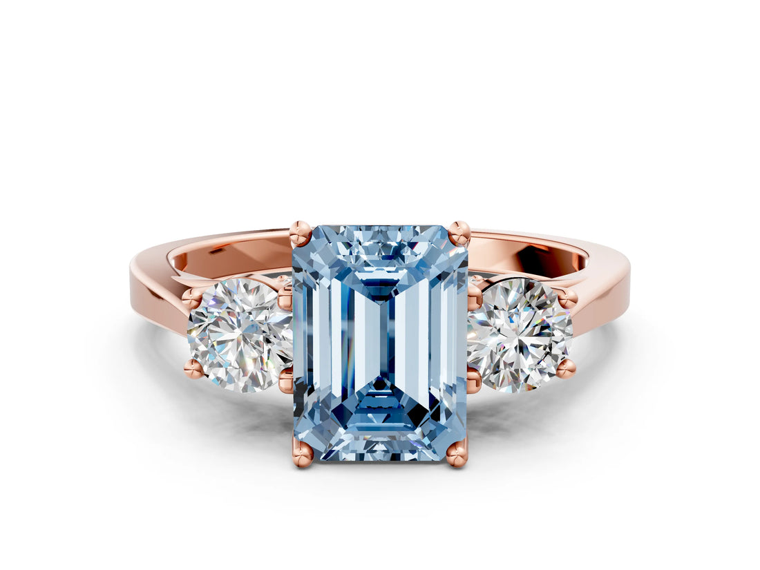 Rose gold Fancy Blue Emerald Cut Diamond Three-Stone Engagement Ring with Prong Setting and Pavé Band