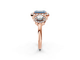 Rose gold Fancy Blue Emerald Cut Diamond Three-Stone Halo Ring with Prong Setting and Pavé Accents_2