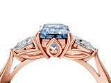 Rose gold Fancy Blue Emerald Cut Diamond Three-Stone Ring with Pear Side Stones and Four-Prong Setting_76