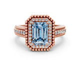 Rose gold Fancy Blue Emerald Cut Halo Diamond Ring with Beaded Split Shank and Four-Prong Setting