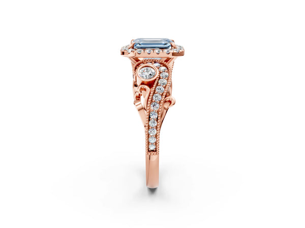 Rose gold Fancy Blue Emerald Cut Halo Diamond Ring with Milgrain and Bezel Accents on a Split Shank Band