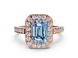 Rose gold Fancy Blue Emerald Cut Halo Diamond Ring with Pavé Band and Three-Prong Setting
