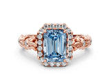Rose gold Fancy Blue Emerald Cut Halo Diamond Solitaire with Filigree Band and Four-Prong Setting