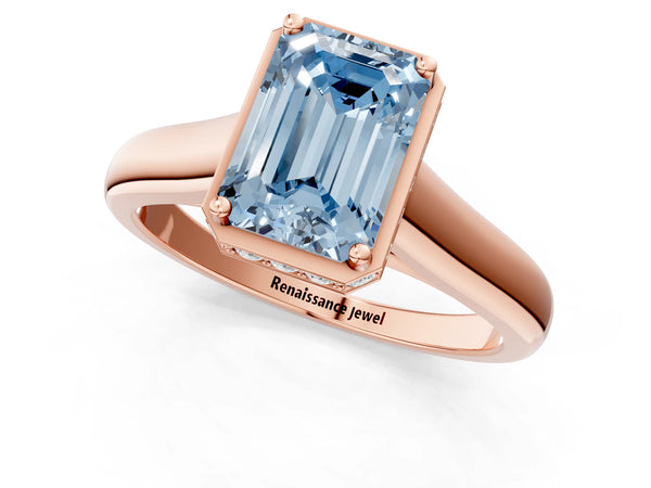 Rose gold Fancy Blue Emerald Cut Solitaire Diamond Engagement Ring with Four-Prong Setting and Tapered Band