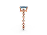 Rose gold Fancy Blue Emerald Cut Solitaire Diamond Ring with Infinity Twist Band and Four-Prong Setting_2