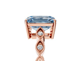 Rose gold Fancy Blue Emerald Cut Solitaire Diamond Ring with Infinity Twist Band and Four-Prong Setting_5