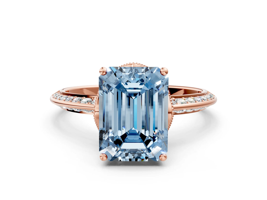 Rose gold Fancy Blue Emerald Cut Solitaire Split Shank Pave Diamond Engagement Ring with Four-Prong Setting
