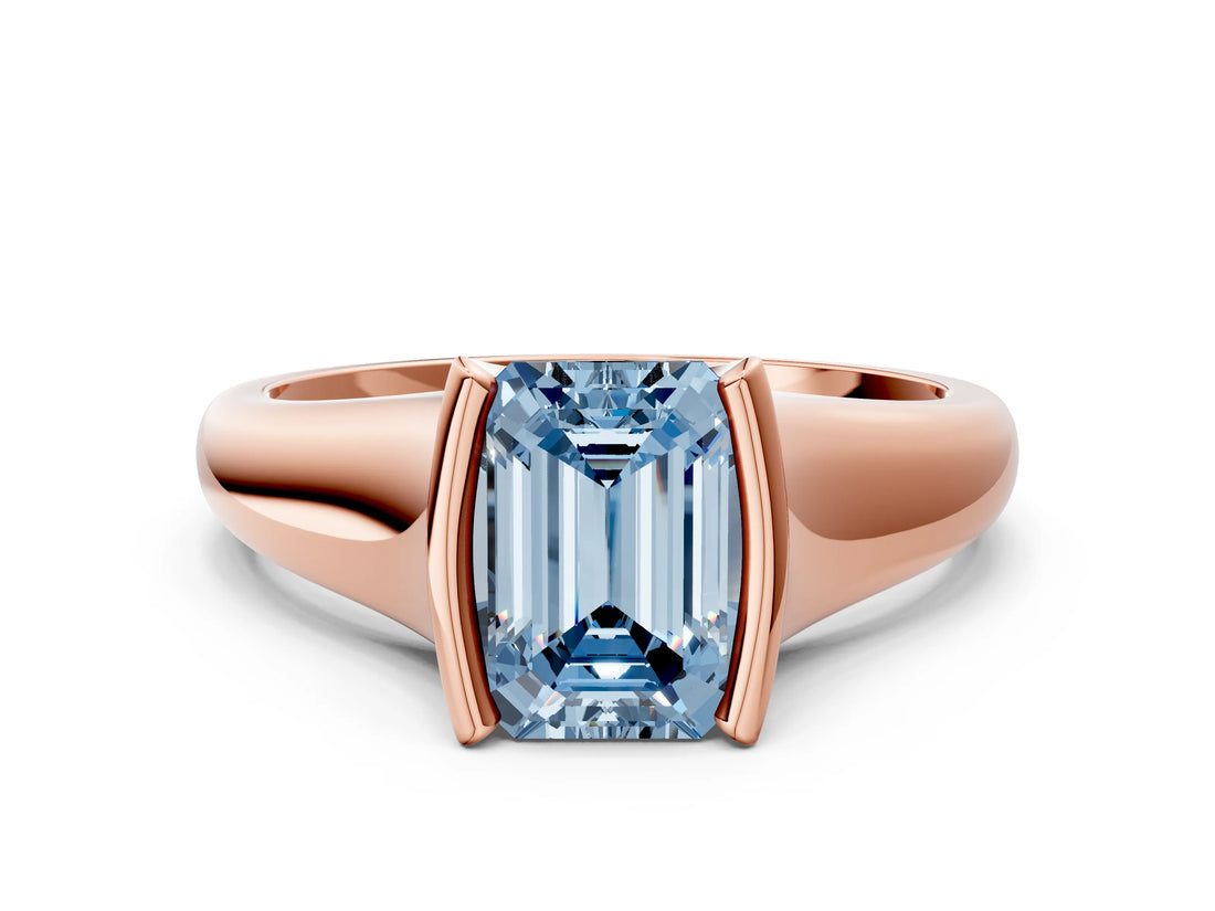 Rose gold Fancy Blue Emerald Cut Solitaire Tension Set Diamond Ring with Split Shank Band