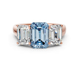 Rose gold Fancy Blue Emerald Cut Three-Stone Diamond Ring with Prong Setting on a Classic Band_12
