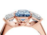 Rose gold Fancy Blue Emerald Cut Three-Stone Diamond Ring with Prong Setting on a Classic Band_16