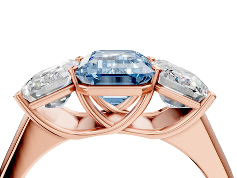 Rose gold Fancy Blue Emerald Cut Three-Stone Diamond Ring with Prong Setting on a Classic Band_4
