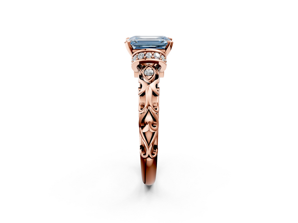 Rose gold Fancy Blue Emerald Cut Diamond Solitaire Ring with Filigree Band and Four-Prong Setting