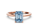 Rose gold Fancy Blue Emerald  Solitaire Diamond Ring with Six-Prong Setting on a Classic Band