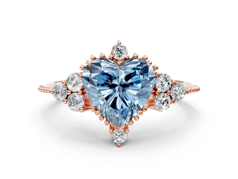 Rose gold Fancy Blue Heart Cut Brilliant Diamond with Cluster Setting on a Beaded Band and Four-Prong Setting