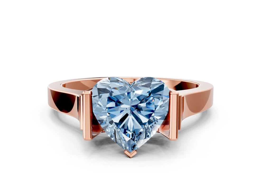 Rose gold Fancy Blue Heart Cut Brilliant Solitaire Diamond Ring with Channel Set Band and Bar Prong Setting