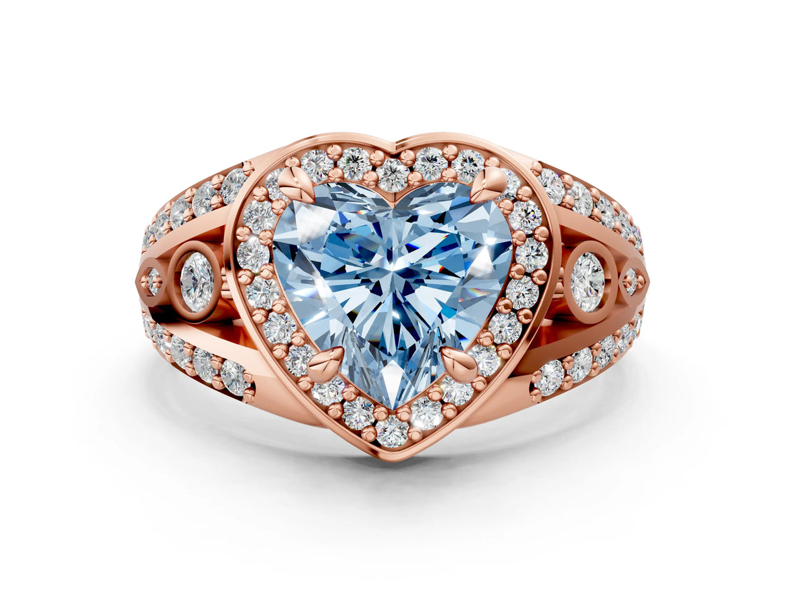 Rose gold Fancy Blue Heart Cut Diamond Halo Ring with Split Shank and Bezel Accents and Four-Prong Setting
