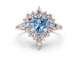 Rose gold Fancy Blue Heart Cut Halo Diamond Cluster Ring with Marquise and Round Stones on a White Gold Band with Prong Setting