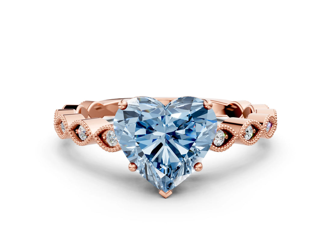 Rose gold Fancy Blue Heart Cut Solitaire Diamond Ring with Infinity Twist Band and Four-Prong Setting