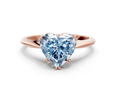Rose gold Fancy Blue Heart Cut Solitaire Diamond Ring with Six-Prong Setting and Classic Band