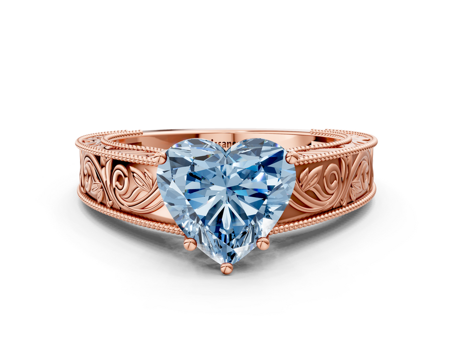Rose gold Fancy Blue Heart Cut Diamond Solitaire Ring with Engraved Band and Four-Prong Setting