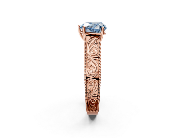 Rose gold Fancy Blue Heart Cut Diamond Solitaire Ring with Engraved Band and Four-Prong Setting