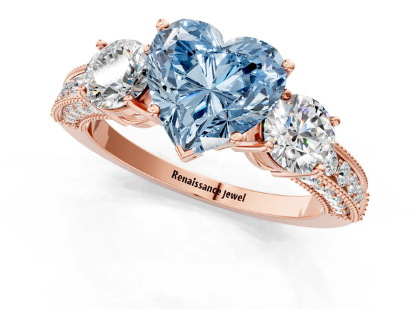 Rose gold Fancy Blue Heart Cut Three-Stone Diamond Ring with Pavé Band and Four-Prong Setting