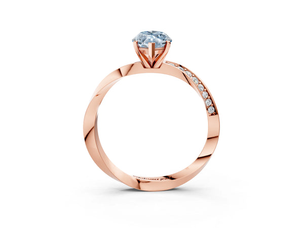 Rose gold Fancy Blue Marquise Cut Diamond Engagement Ring with Side Stone Accents and Four-Prong Setting
