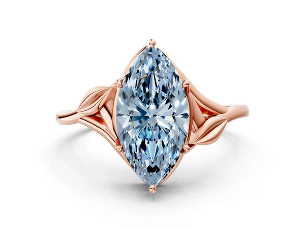 Rose gold Fancy Blue Marquise Cut Diamond Solitaire Ring with Twist Band and Four-Prong Setting